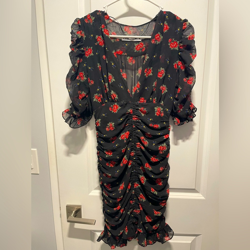 Zara Women’s floral ruffled form fitting mini dress (small)